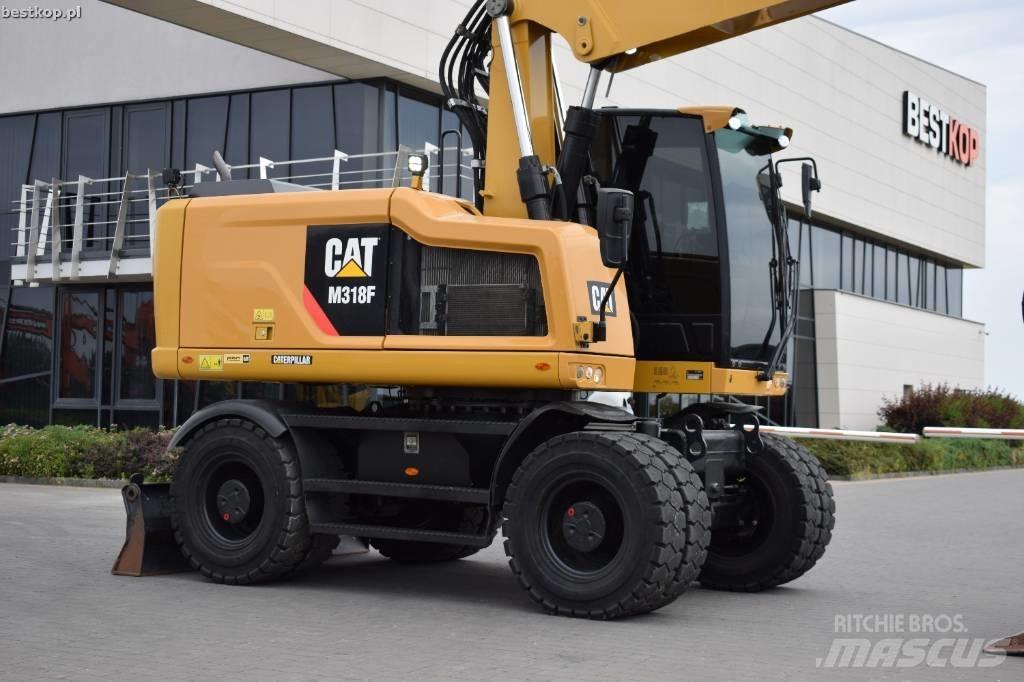 CAT M 318 F Gumikerekes kotrók