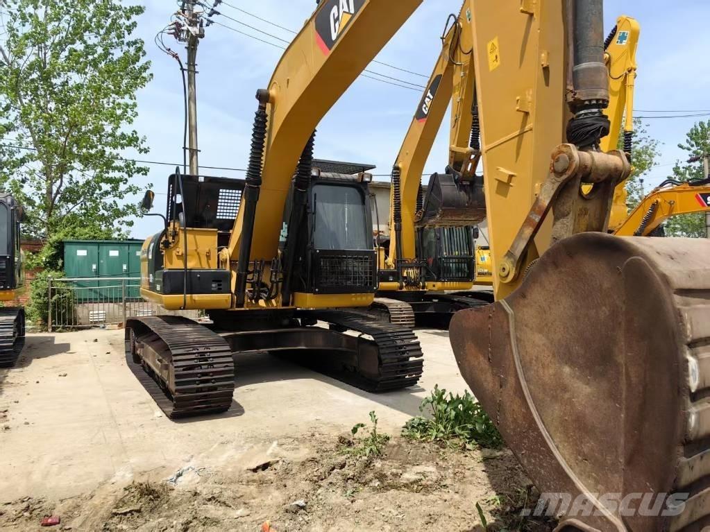 CAT 323 D Lánctalpas kotrók