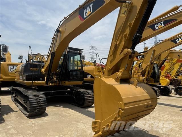 CAT 323 D L Lánctalpas kotrók