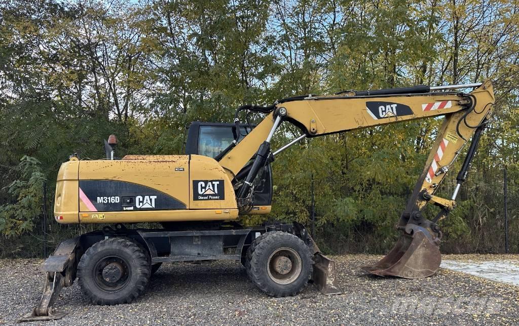 CAT M 316 D Gumikerekes kotrók