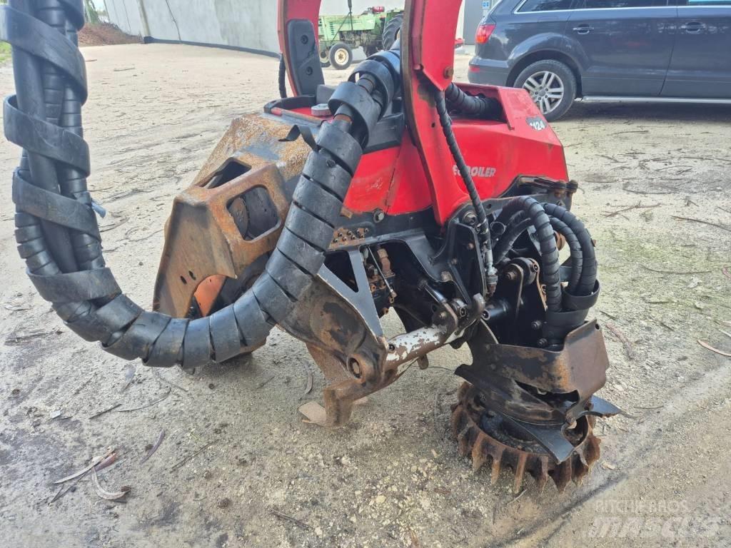 Komatsu C 124 Betakarító fejek