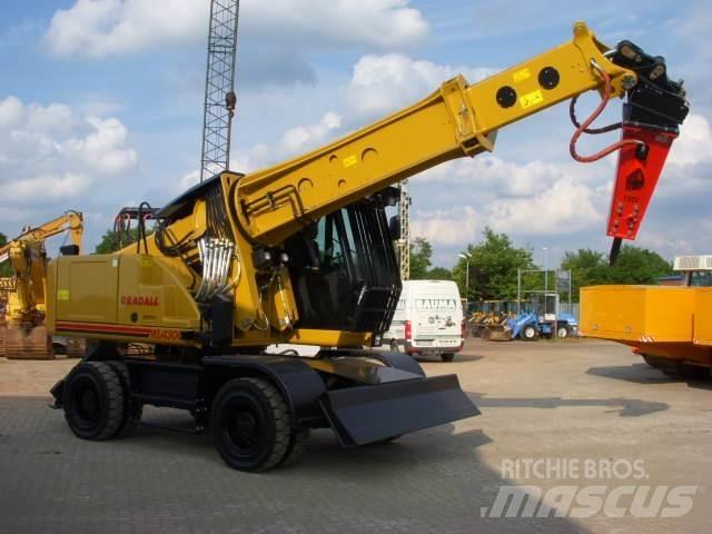 Gradall XL 4300 Gumikerekes kotrók
