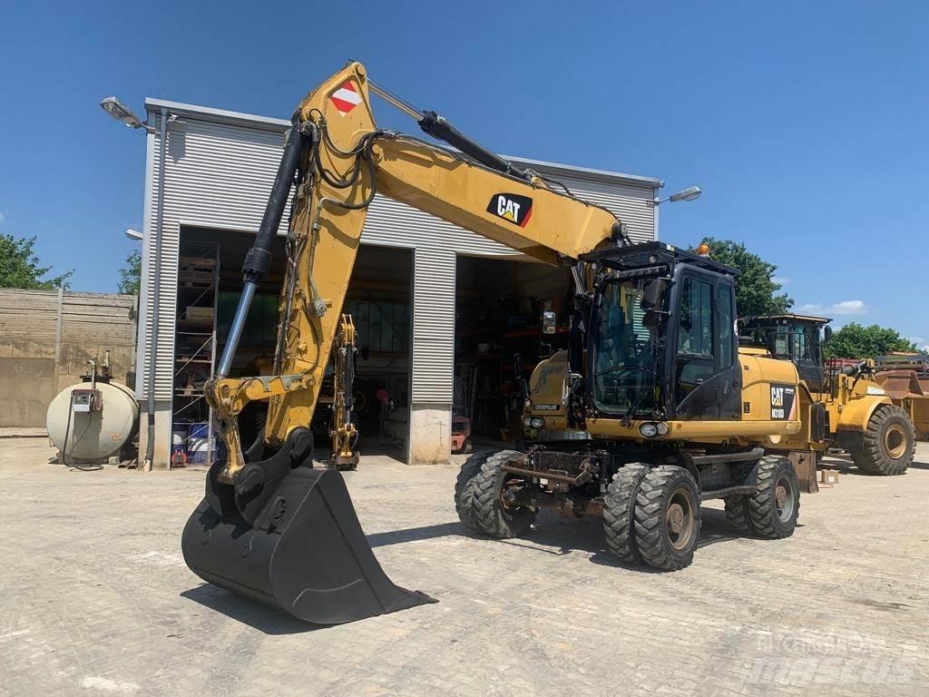 CAT M 318 D Gumikerekes kotrók