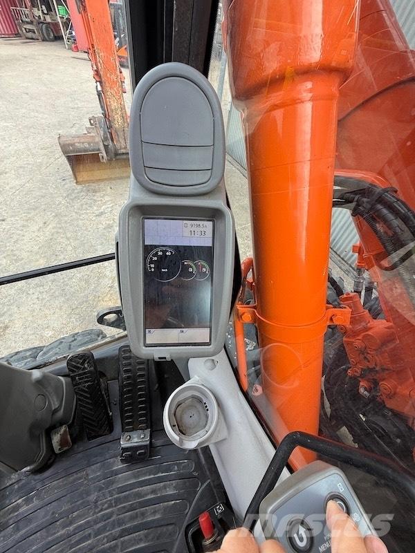 Hitachi ZX 140 W-5 Gumikerekes kotrók