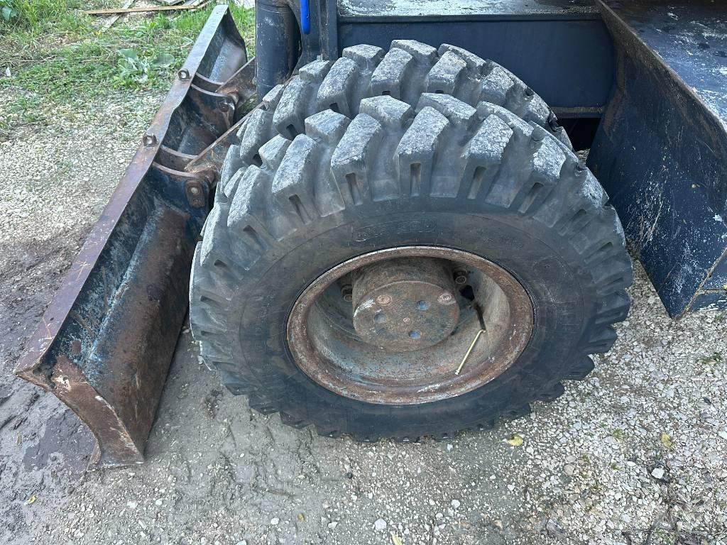 Komatsu PW 160-7E0 Gumikerekes kotrók