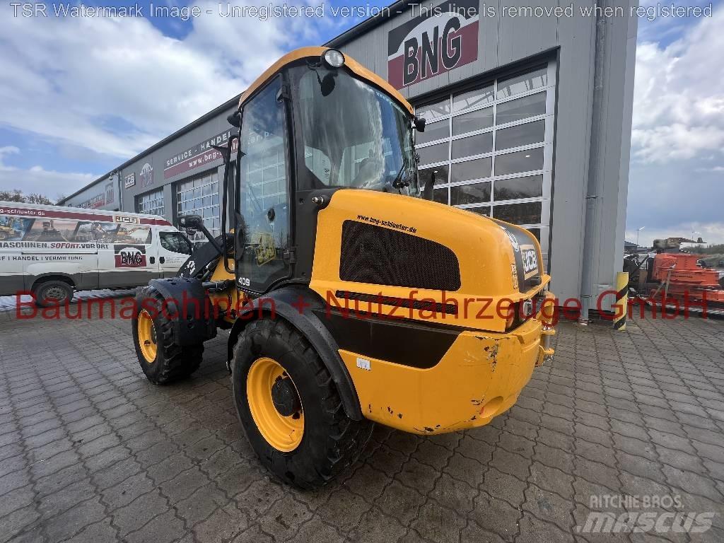 JCB 409 -gebraucht- Gumikerekes homlokrakodók