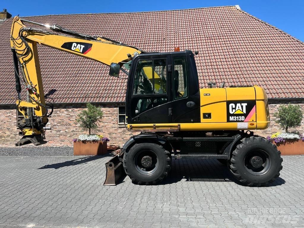 CAT M 313 D Gumikerekes kotrók