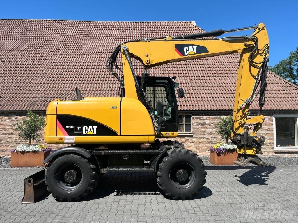 CAT M 313 D Gumikerekes kotrók