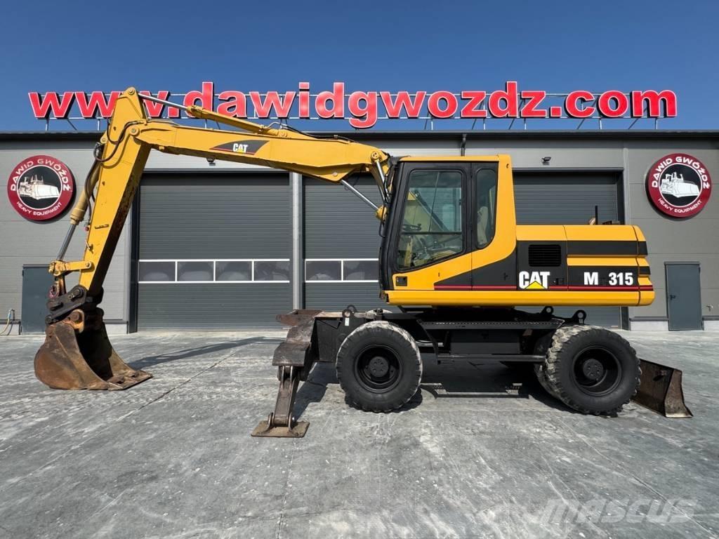 CAT M 315 Gumikerekes kotrók