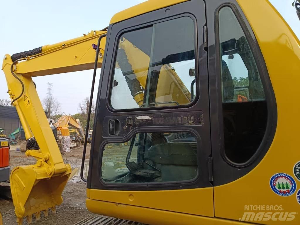 Komatsu PC120 Közepes (midi) kotrók 7 t - 12 t