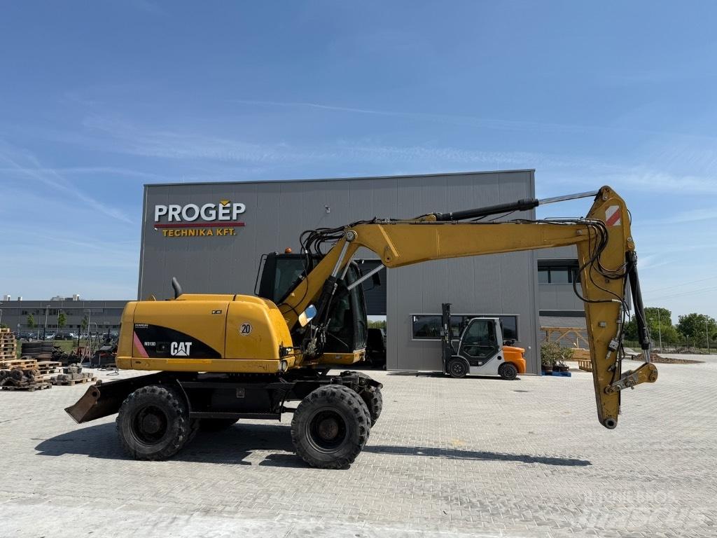 CAT M 313 D VAH Gumikerekes kotrók