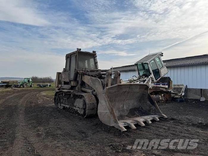 CAT 973C - Gumikerekes homlokrakodók