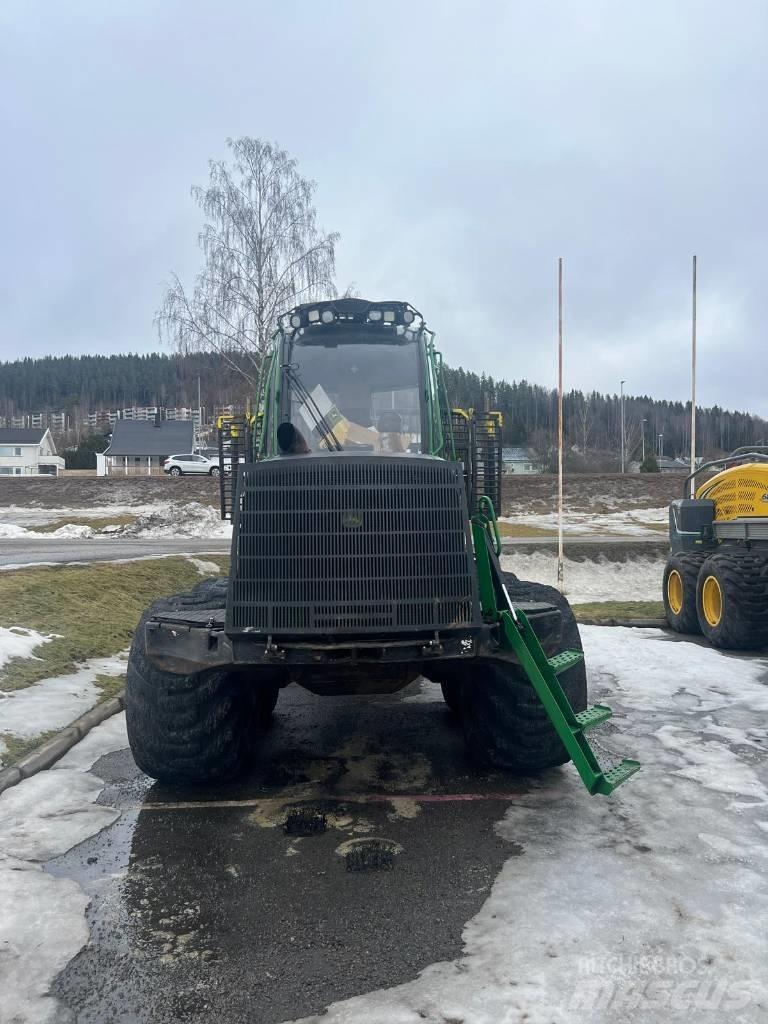 John Deere 1210 E Kihordók