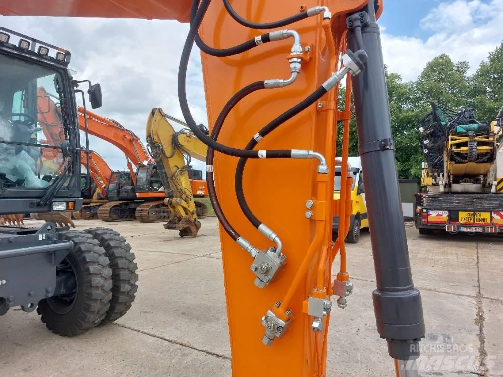 Develon DX 140 W-7 Gumikerekes kotrók