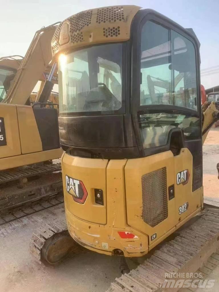 CAT 302 Mini kotrók < 7t