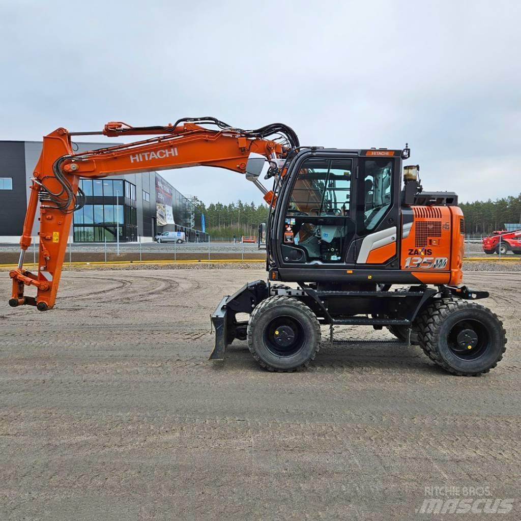 Hitachi ZX 135W Gumikerekes kotrók