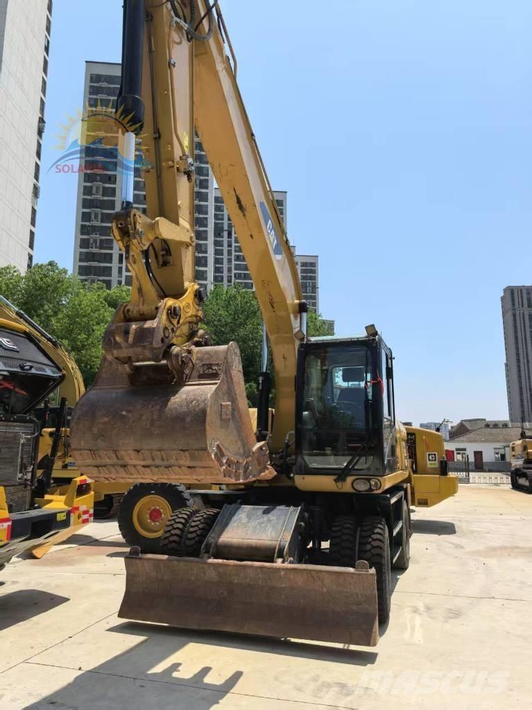 CAT M 320D2 Gumikerekes kotrók