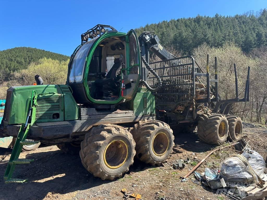 John Deere 810 E Kihordók