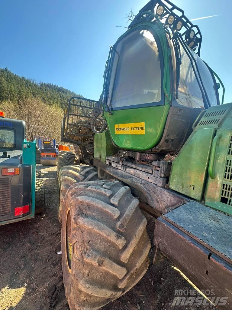 John Deere 810 E Kihordók