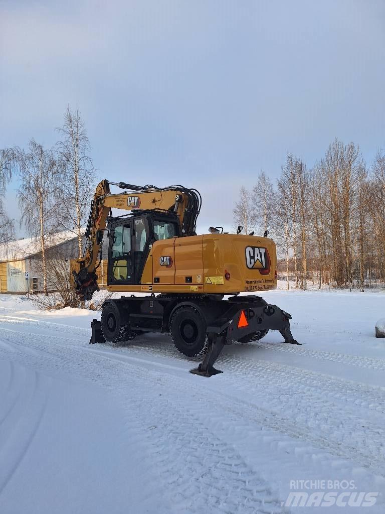 CAT M 318 Gumikerekes kotrók