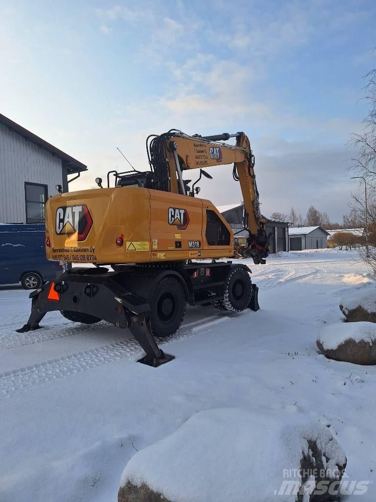 CAT M 318 Gumikerekes kotrók