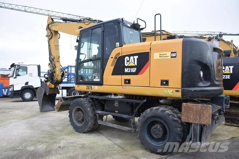 CAT M316F Gumikerekes kotrók