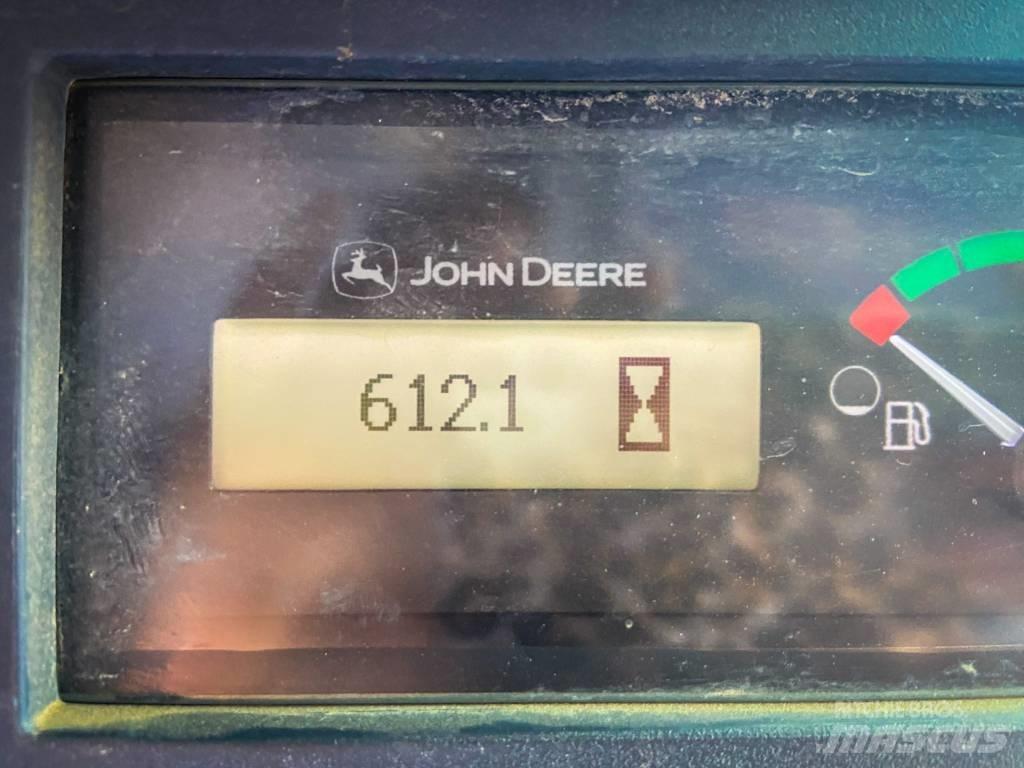 John Deere 323 E Kompaktrakodók