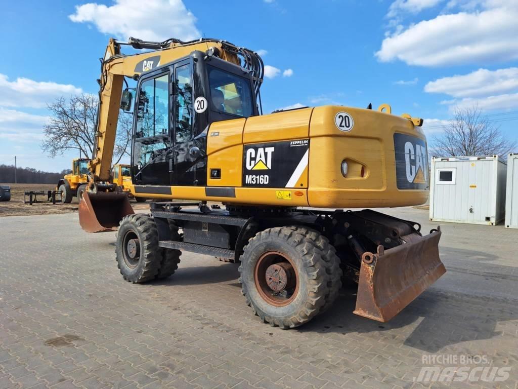 CAT M 316 D Gumikerekes kotrók