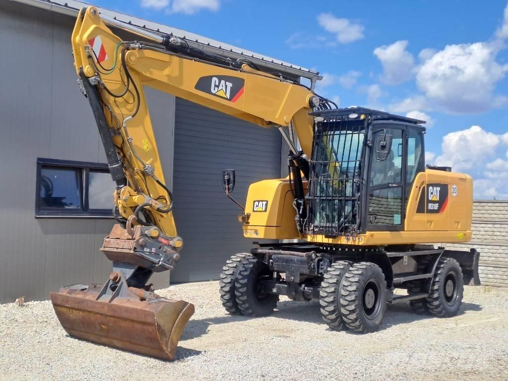CAT M318F Gumikerekes kotrók