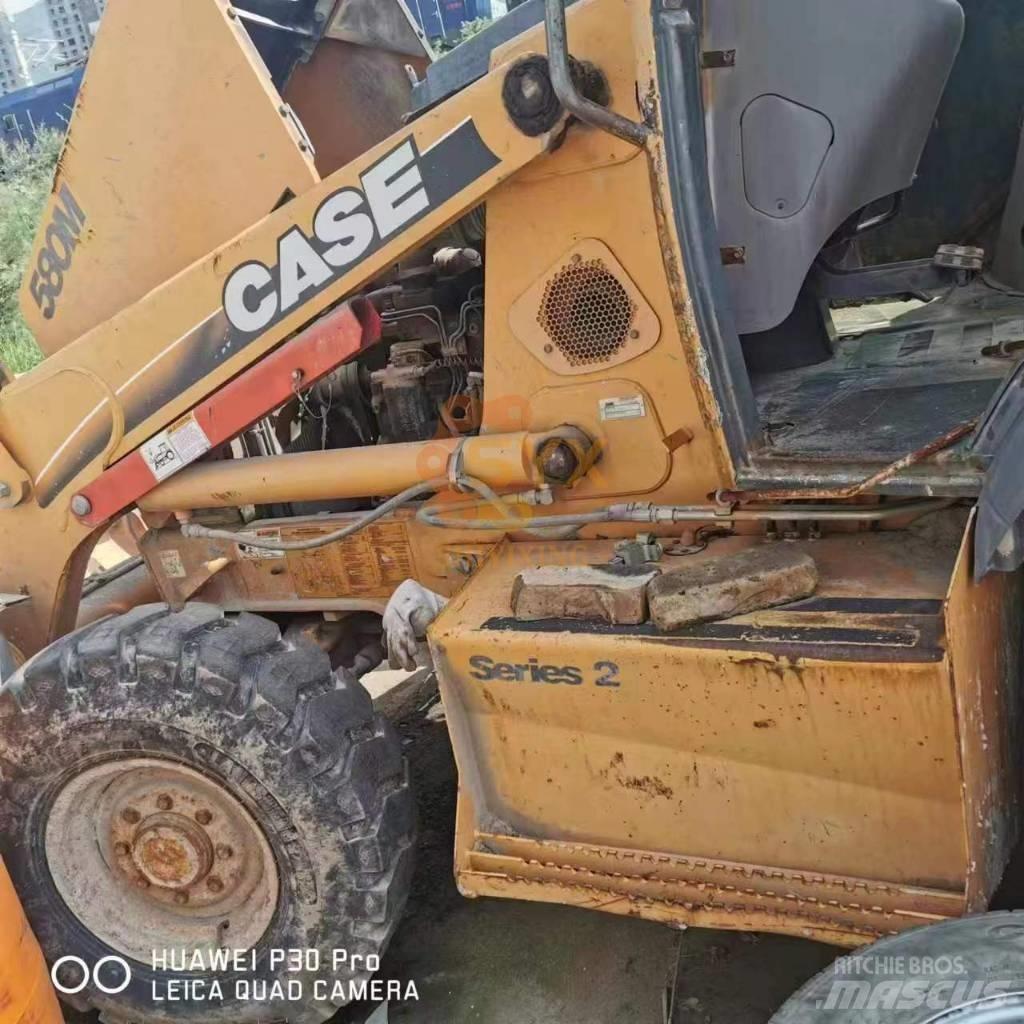 CASE 580 Betakarítók
