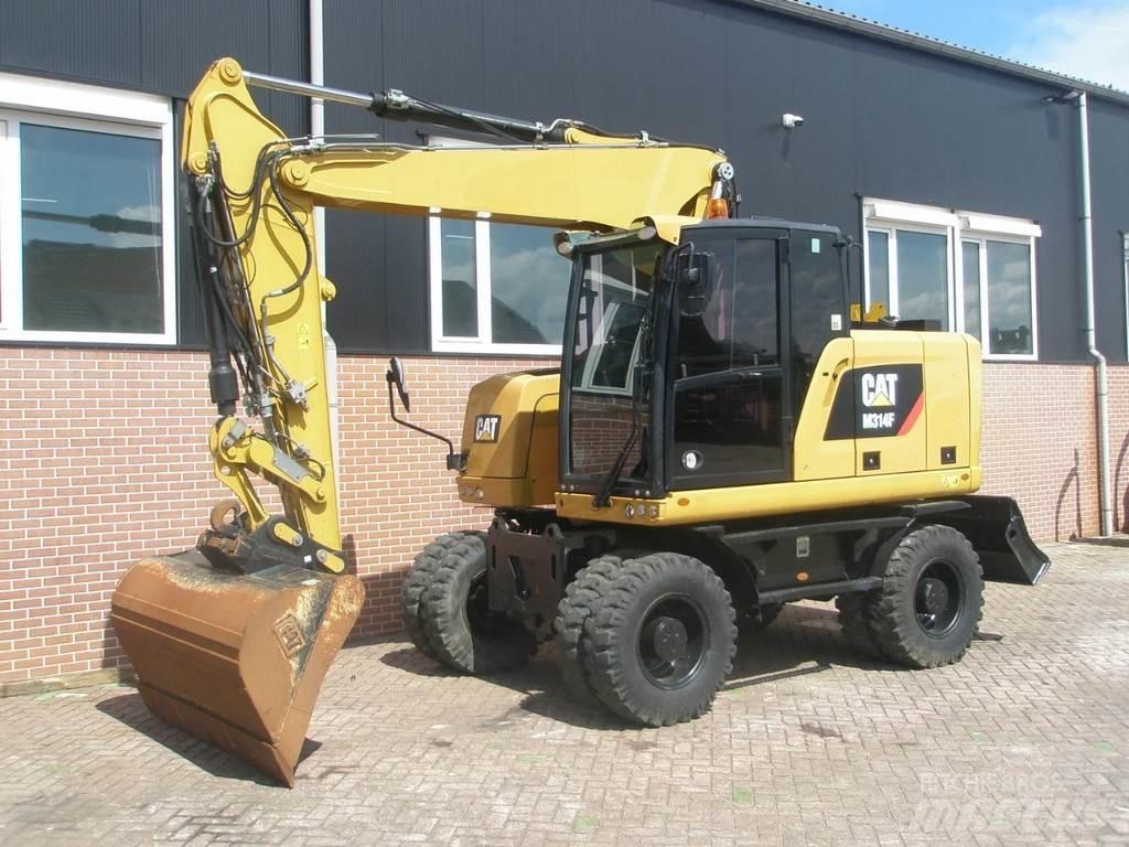 CAT M314F Gumikerekes kotrók