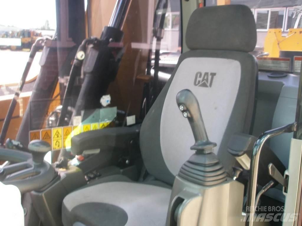 CAT M314F Gumikerekes kotrók