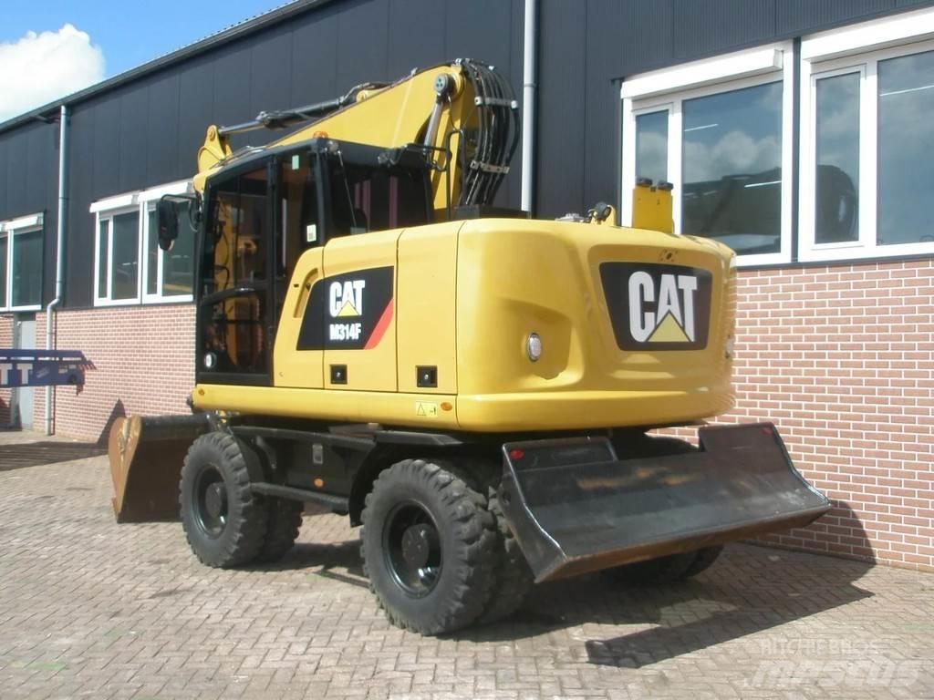 CAT M314F Gumikerekes kotrók