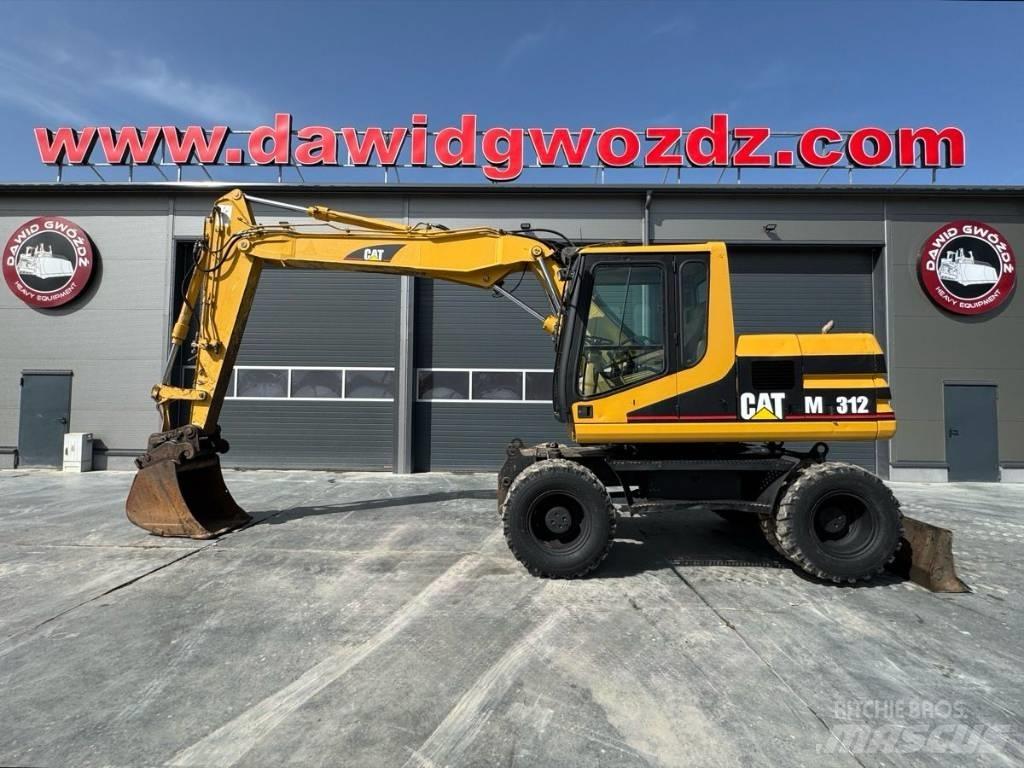 CAT M 312 Gumikerekes kotrók