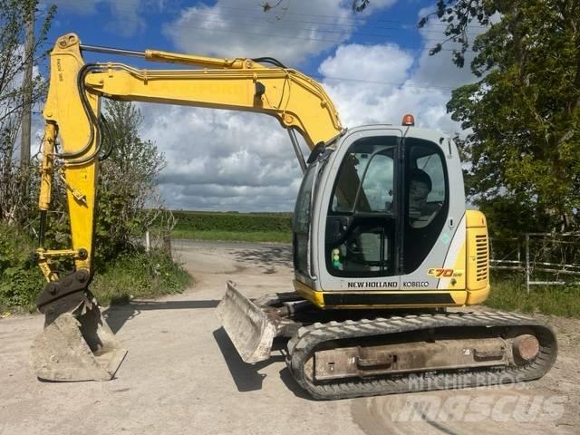 New Holland E 70 SR Közepes (midi) kotrók 7 t - 12 t