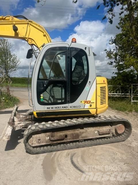 New Holland E 70 SR Közepes (midi) kotrók 7 t - 12 t