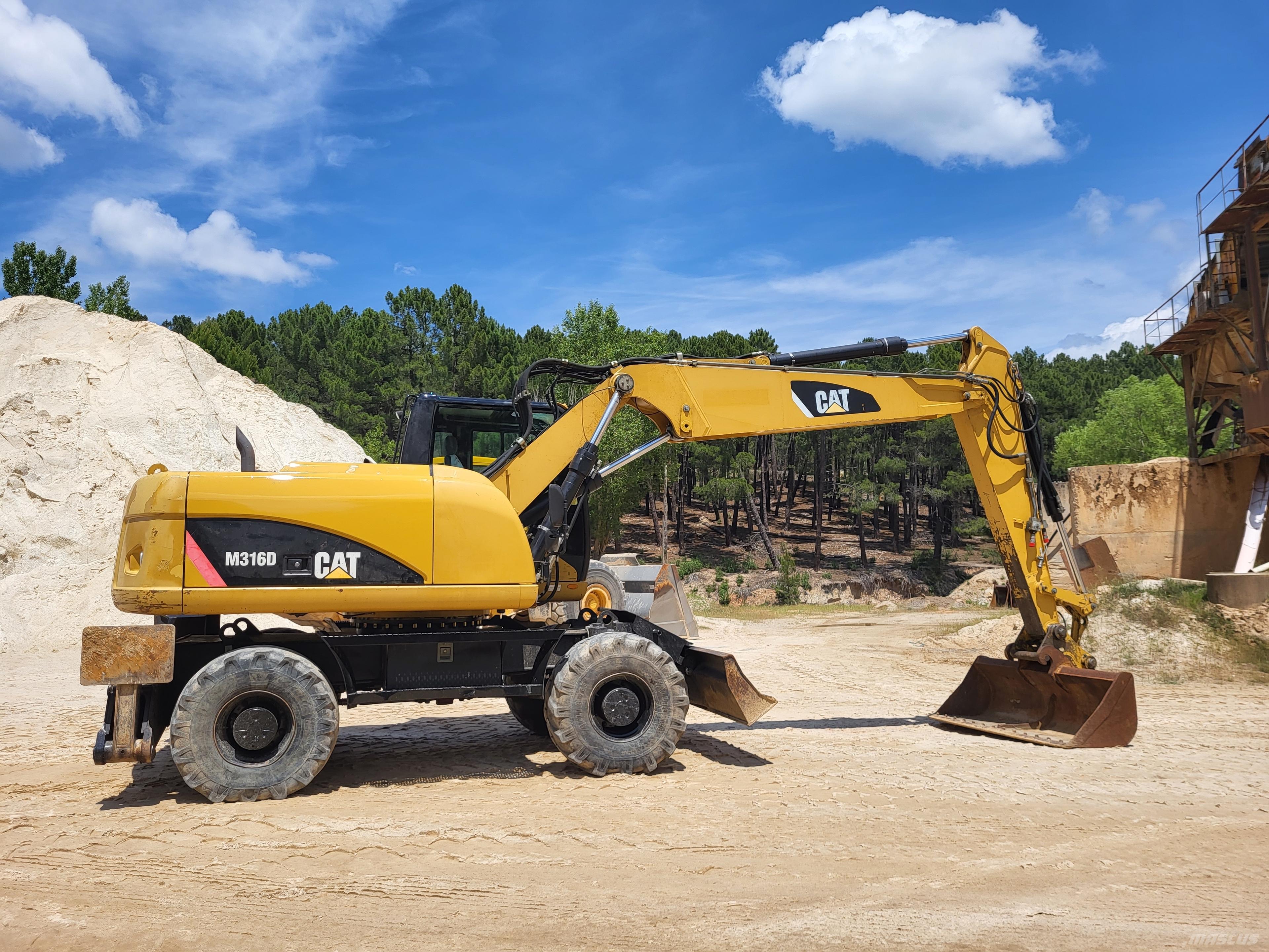CAT 316d Gumikerekes kotrók