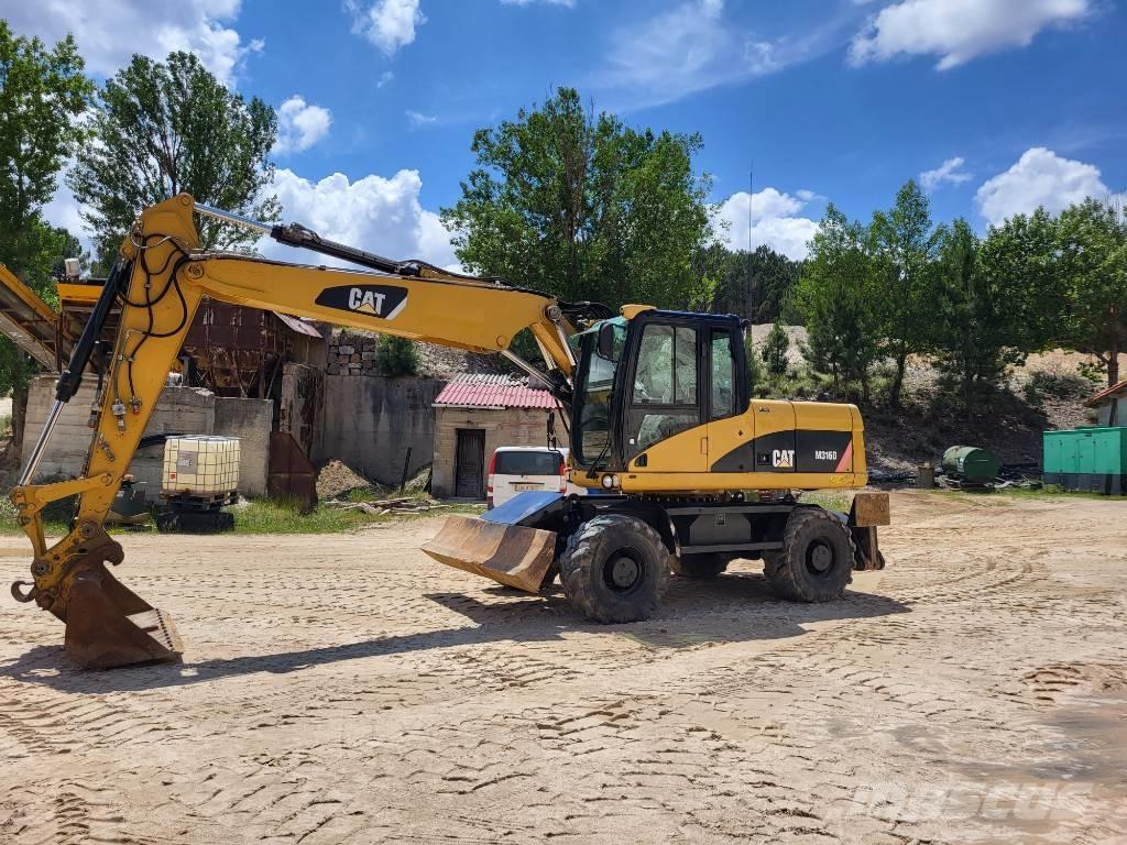 CAT 316d Gumikerekes kotrók