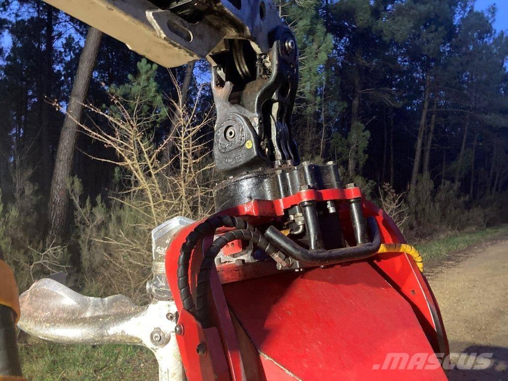 Komatsu C 144 Betakarítók