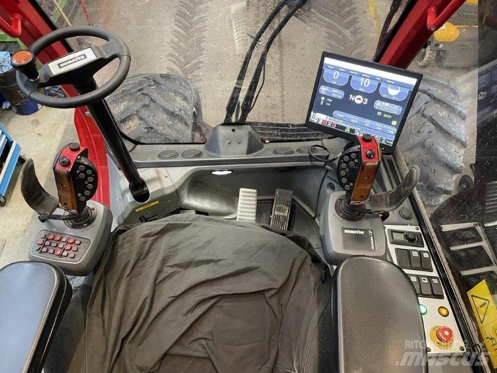 Komatsu 931 XC Betakarítók