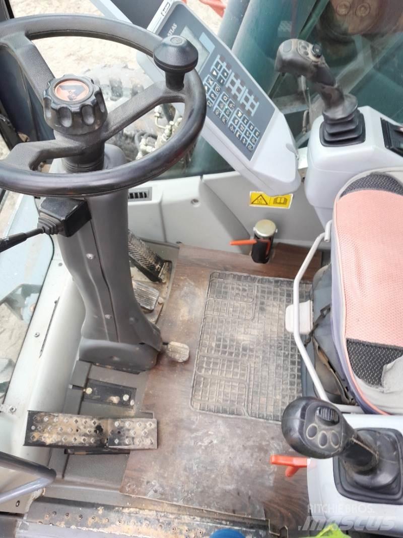 Atlas 160W Gumikerekes kotrók