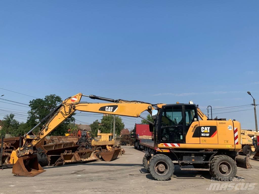 CAT M 318 F Gumikerekes kotrók