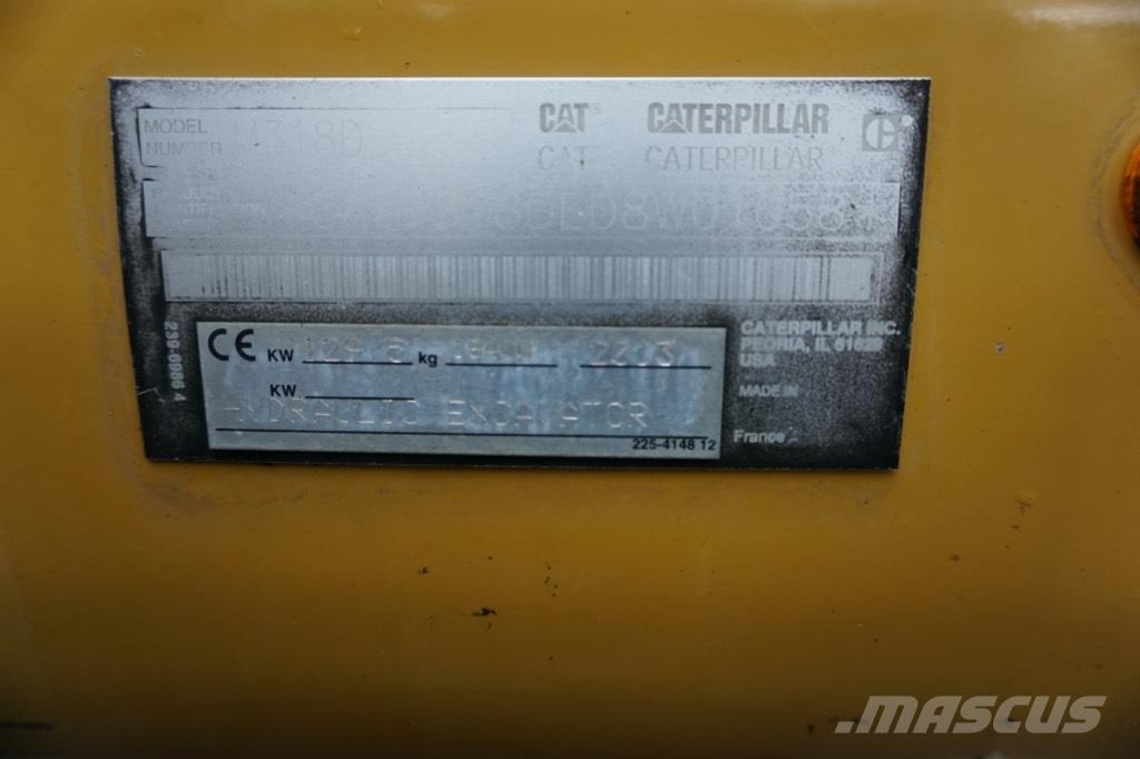 CAT M 318 D Gumikerekes kotrók