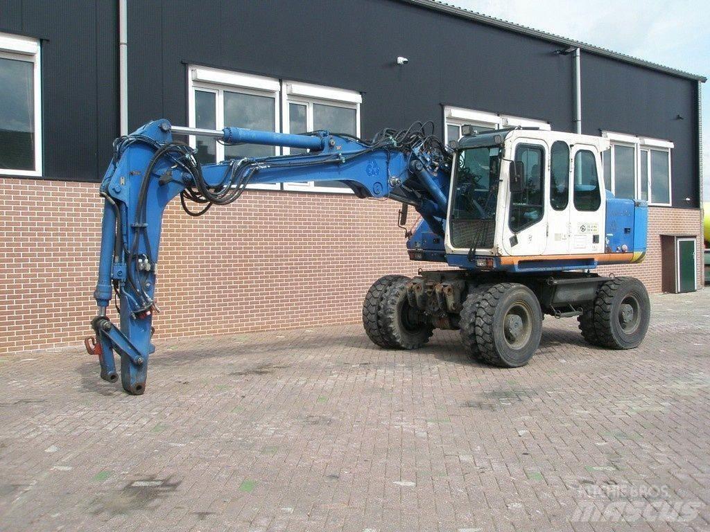 Atlas 1404 Gumikerekes kotrók