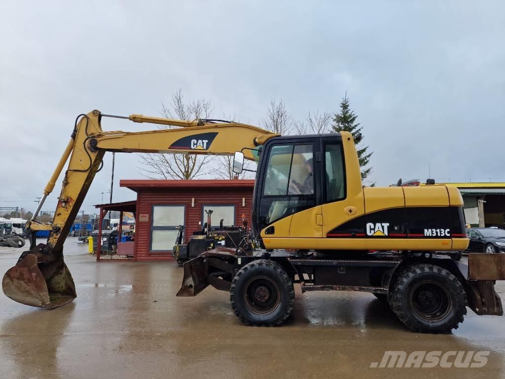 CAT M 313 C Gumikerekes kotrók