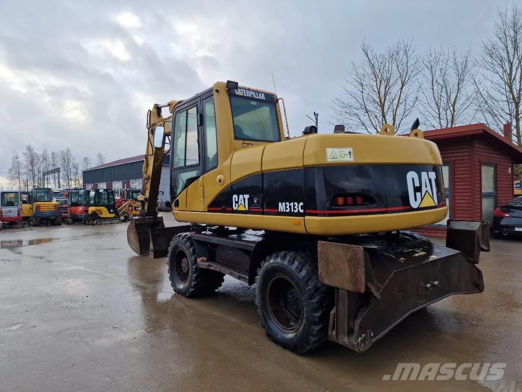 CAT M 313 C Gumikerekes kotrók