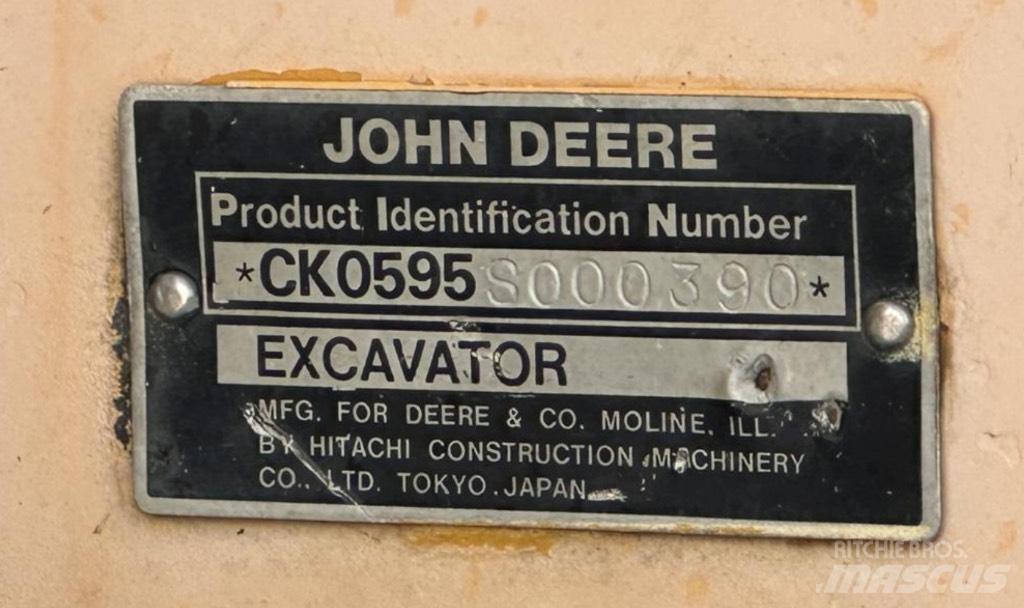John Deere 595 Gumikerekes kotrók
