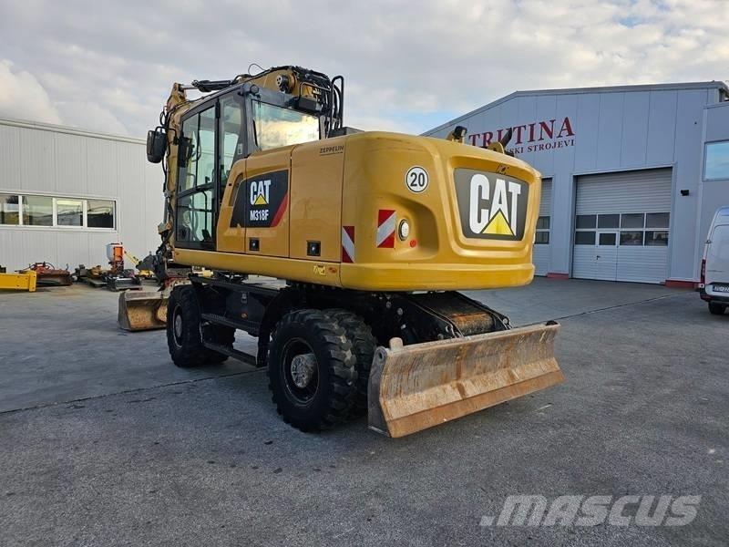 CAT M 318 F Gumikerekes kotrók