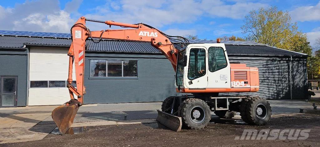 Atlas 1304 Gumikerekes kotrók