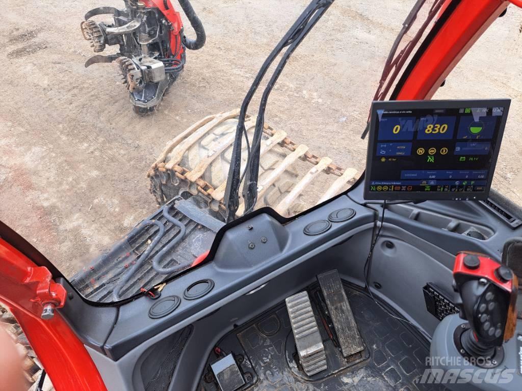 Komatsu 901 Betakarítók